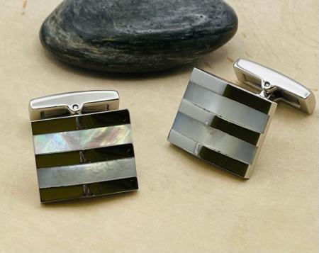 Stainless Steel mother of pearl inlay cuff links. $99.00